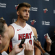 Former NBA player Meyers Leonard looking regretful at a post-game press conference.